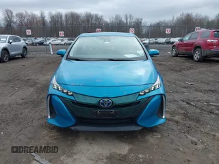 2017 Toyota Prius Plus z VIN JTDKARFP0H3016014, wystawiony jako IAAI lot #41797703 z przebiegiem 80 657 mil mil oraz . Historia ofert i sprzedaży dostępna na DreamBid. Obrazek 13.