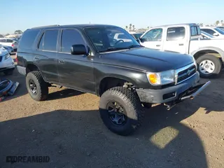 1998 Toyota 4Runner with VIN JT3GM84R6W0028070, listed as a IAAI auction lot 41850921 with 176,871 mi miles. Bid and sale history available at carsss.com. Image 1.