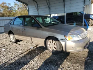 2000 Toyota Avalon XL z VIN 4T1BF28B2YU079163, wystawiony jako Copart lot #50129935 z przebiegiem 311 916 mil mil oraz Nie do naprawy • Non repairable. Historia ofert i sprzedaży dostępna na DreamBid. Obrazek 4.