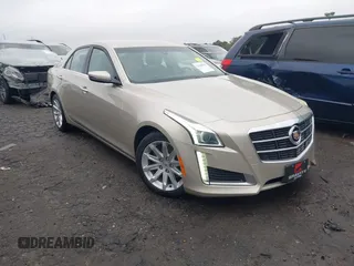 2014 Cadillac CTS RWD with VIN 1G6AP5SX0E0163457, listed as a IAAI auction lot 41460541 with 111,229 mi miles and . Bid and sale history available at DreamBid. Image 1.