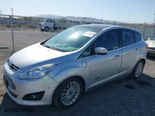 2013 Ford C-Max Energi SEL with VIN 1FADP5CU1DL521392, listed as a IAAI auction lot 41976775 with 121,715 mi miles. Bid and sale history available at carsss.com. Image 2.