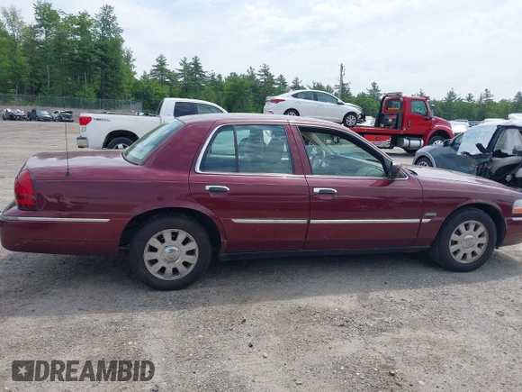 2005 Mercury Grand Marquis LS Premium z VIN 2MEHM75W05X636003, wystawiony jako IAAI lot #42480277 z przebiegiem 224 789 mil mil oraz . Historia ofert i sprzedaży dostępna na DreamBid. Obrazek 14.