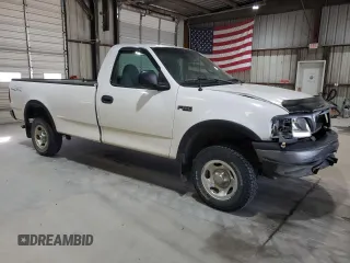 2000 Ford F-150 XL with VIN 1FTZF182XYNC09505, listed as a Copart auction lot 73420184 with 296,202 mi miles and Salvage title. Bid and sale history available at DreamBid. Image 4.