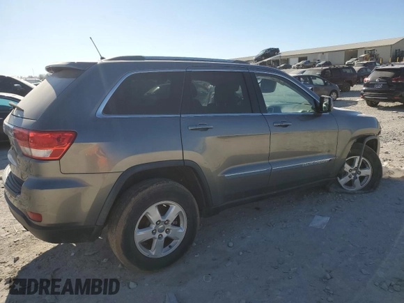 2012 Jeep Grand Cherokee Laredo with VIN 1C4RJEAG0CC299568, listed as a Copart auction lot 80455464 with 98,540 mi miles and Salvage Title. Bid and sale history available at carsss.com. Image 3.