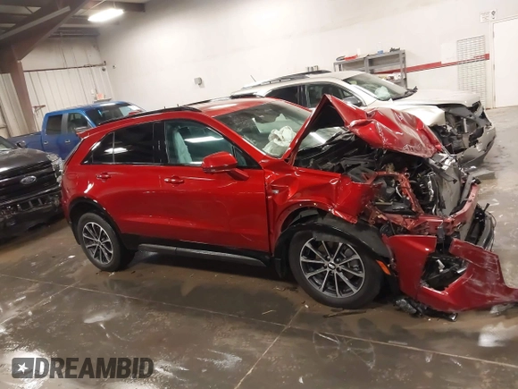 2024 Cadillac XT4 AWD Sport z VIN 1GYFZFR42RF154352, wystawiony jako IAAI lot #41249916 z przebiegiem 27 378 mil mil oraz . Historia ofert i sprzedaży dostępna na DreamBid. Obrazek 13.