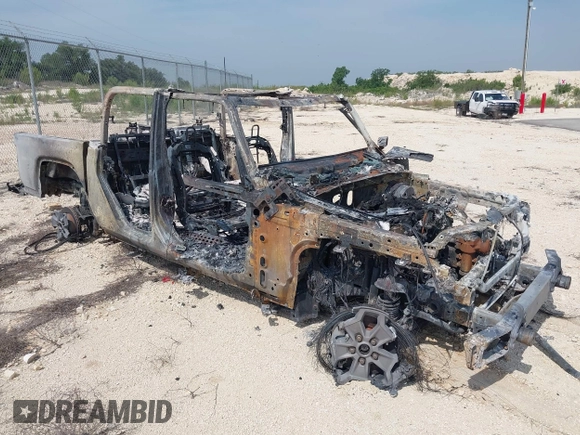 2023 Jeep Gladiator Sport S z VIN 1C6HJTAG8PL558868, wystawiony jako IAAI lot #42264859 z przebiegiem Nie podano mil oraz . Historia ofert i sprzedaży dostępna na DreamBid. Obrazek 1.