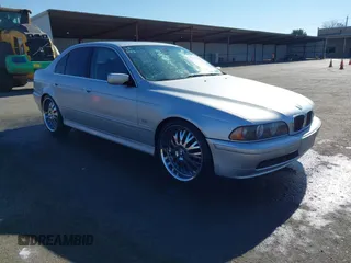 2003 BMW 5 Series 525i with VIN WBADT33473GF43821, listed as a IAAI auction lot 41450822 with 165,062 mi miles. Bid and sale history available at carsss.com. Image 1.