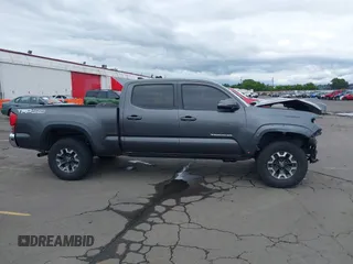 2017 Toyota Tacoma SR5 with VIN 3TMDZ5BN3HM027098, listed as a IAAI auction lot 42409977 with 97,224 mi miles and . Bid and sale history available at DreamBid. Image 14.