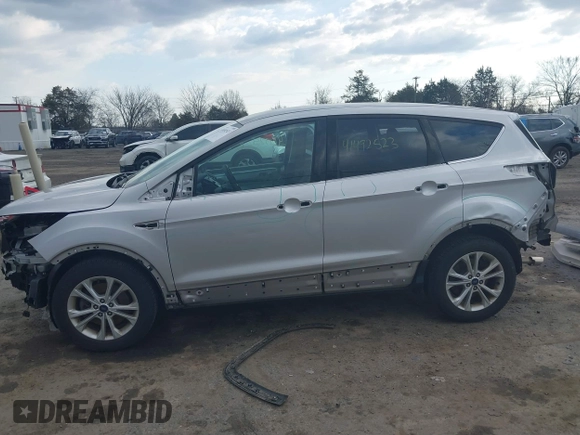 2017 Ford Escape SE z VIN 1FMCU9GDXHUA46689, wystawiony jako IAAI lot #41492523 z przebiegiem 67 401 mil mil oraz . Historia ofert i sprzedaży dostępna na DreamBid. Obrazek 17.