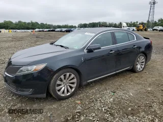 2014 Lincoln MKS with VIN 1LNHL9DK3EG607305, listed as a Copart auction lot 61522935 with 142,259 mi miles and Salvage title. Bid and sale history available at DreamBid. Image 1.