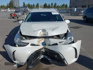 2017 Toyota Prius v Two with VIN JTDZN3EU9HJ066736, listed as a IAAI auction lot 42025100 with 89,082 mi miles. Bid and sale history available at carsss.com. Image 6.