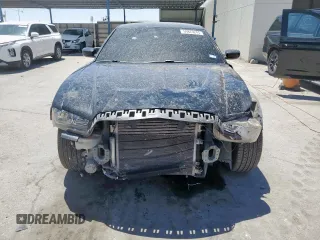 2013 Dodge Charger Police z VIN 2C3CDXAT2DH722403, wystawiony jako Copart lot #59879245 z przebiegiem 195 730 mil mil oraz Szkoda całkowita • Salvage title. Historia ofert i sprzedaży dostępna na DreamBid. Obrazek 5.