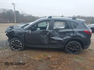 2016 Mazda CX-5 Grand Touring with VIN JM3KE4DY1G0743897, listed as a IAAI auction lot 41935796 with 167,150 mi miles and . Bid and sale history available at carsss.com. Image 15.