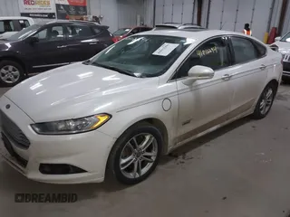 2016 Ford Fusion Titanium with VIN 3FA6P0SU8GR259163, listed as a IAAI auction lot 41812294 with 151,002 mi miles and . Bid and sale history available at DreamBid. Image 2.