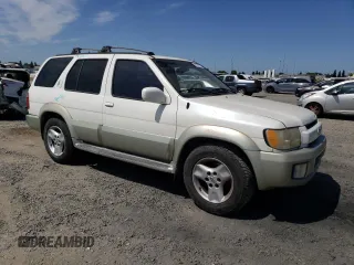 2001 Infiniti QX4 Luxury z VIN JNRDR09Y21W212879, wystawiony jako Copart lot #57227755 z przebiegiem 164 465 mil mil oraz Szkoda całkowita • Salvage title. Historia ofert i sprzedaży dostępna na DreamBid. Obrazek 4.