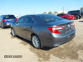 2014 Toyota Camry L with VIN 4T1BF1FK4EU733637, listed as a IAAI auction lot 41979947 with 120,060 mi miles. Bid and sale history available at carsss.com. Image 3.