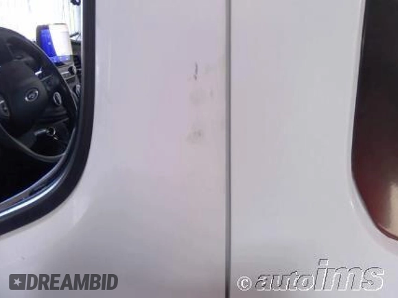 2020 Ford Transit Cargo with VIN 1FTBW3X82LKB36188, listed as a IAAI auction lot 42828633 with 71,589 mi miles and . Bid and sale history available at DreamBid. Image 11.