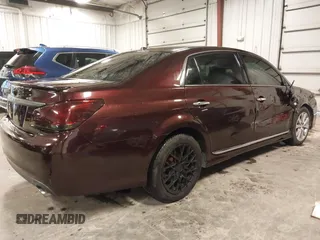 2011 Toyota Avalon with VIN 4T1BK3DB4BU433408, listed as a IAAI auction lot 40596175 with 123,529 mi miles and . Bid and sale history available at carsss.com. Image 4.