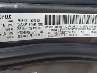 2014 Jeep Grand Cherokee Laredo with VIN 1C4RJEAG1EC573704, listed as a IAAI auction lot 41864355 with 141,970 mi miles. Bid and sale history available at carsss.com. Image 9.