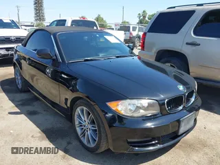 2011 BMW 1 Series 128i z VIN WBAUN1C50BVH83665, wystawiony jako IAAI lot #42595358 z przebiegiem 128 001 mil mil oraz . Historia ofert i sprzedaży dostępna na DreamBid. Obrazek 1.