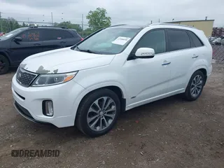2014 Kia Sorento SX z VIN 5XYKWDA71EG520204, wystawiony jako IAAI lot #42388830 z przebiegiem 193 262 mil mil oraz . Historia ofert i sprzedaży dostępna na DreamBid. Obrazek 17.