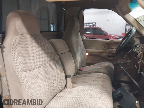 1997 Ford F-150 with VIN 1FTDF1767VKC52713, listed as a IAAI auction lot 42212161 with 136,306 mi miles and . Bid and sale history available at DreamBid. Image 8.