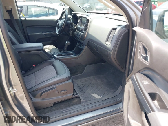 2018 Chevrolet Colorado 4WD Z71 with VIN 1GCGTDENXJ1247717, listed as a IAAI auction lot 42557264 with 91,463 mi miles and . Bid and sale history available at DreamBid. Image 5.