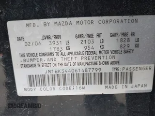 2006 Mazda 3 S Grand Touring with VIN JM1BK344061487799, listed as a IAAI auction lot 41758105 with 98,698 mi miles and . Bid and sale history available at DreamBid. Image 9.