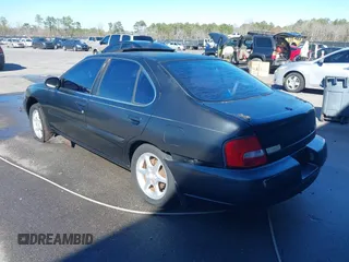 2001 Nissan Altima GXE with VIN 1N4DL01A11C157221, listed as a IAAI auction lot 41702378 with 206,648 mi miles. Bid and sale history available at carsss.com. Image 3.