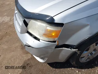 2008 Dodge Grand Caravan SE with VIN 2D8HN44H58R797943, listed as a IAAI auction lot 42073540 with 161,596 mi miles and . Bid and sale history available at DreamBid. Image 6.