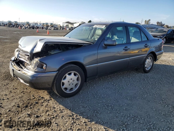 1997 Mercedes-Benz C with VIN WDBHA23E7VF545229, listed as a Copart auction lot 43518335 with 153,158 mi miles and Salvage title. Bid and sale history available at DreamBid. Image 1.