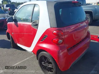 2014 Smart fortwo Pure with VIN WMEEJ3BA0EK757200, listed as a IAAI auction lot 41681977 with 99,245 mi miles and . Bid and sale history available at DreamBid. Image 3.