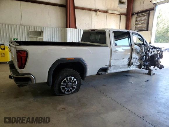2021 GMC Sierra 1500 with VIN 1GT48ME7XMF253322, listed as a Copart auction lot 73474824 with 130,263 mi miles and Salvage Title. Bid and sale history available at DreamBid. Image 3.