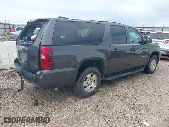 2010 Chevrolet Suburban LS with VIN 1GNUCHE07AR213838, listed as a IAAI auction lot 42523274 with 251,109 mi miles and . Bid and sale history available at DreamBid. Image 4.