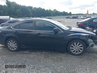 2009 Mazda 6 i Sport with VIN 1YVHP81A595M00988, listed as a IAAI auction lot 42622271 with 151,652 mi miles and . Bid and sale history available at DreamBid. Image 13.
