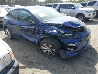 2023 Tesla Model Y Long Range z VIN 7SAYGDEE3PA033533, wystawiony jako IAAI lot #41933287 z przebiegiem 35 364 mil mil oraz . Historia ofert i sprzedaży dostępna na DreamBid. Obrazek 1.