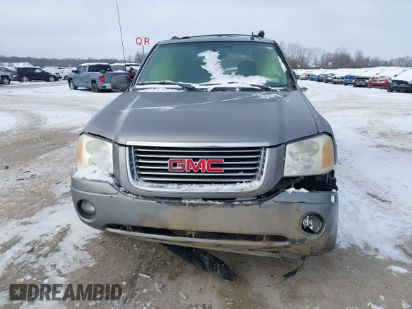 2007 GMC Envoy SLE with VIN 1GKDT13S072246688, listed as a IAAI auction lot 41258265 with 218,001 mi miles. Bid and sale history available at carsss.com. Image 12.