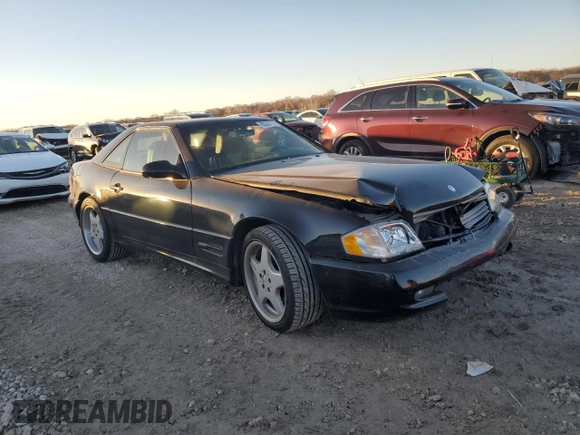 1999 Mercedes-Benz SL-Class with VIN WDBFA68F9XF178143, listed as a Copart auction lot 83255114 with 129,970 mi miles and Salvage Title. Bid and sale history available at carsss.com. Image 4.