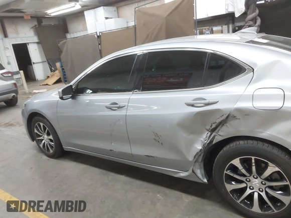 2017 Acura TLX with VIN 19UUB1F31HA007873, listed as a IAAI auction lot 42675667 with 125,869 mi miles and . Bid and sale history available at DreamBid. Image 14.