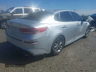 2019 Kia Optima LX with VIN 5XXGT4L36KG292810, listed as a IAAI auction lot 41964263 with 102,898 mi miles. Bid and sale history available at carsss.com. Image 4.