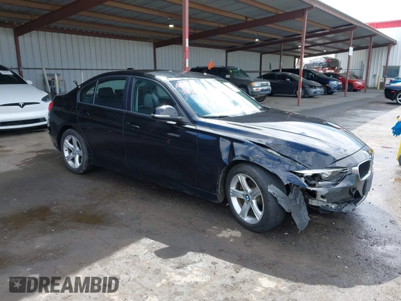 2015 BMW 3 Series 328i with VIN WBA3C1C53FK119723, listed as a IAAI auction lot 41871200 with 112,552 mi miles and . Bid and sale history available at carsss.com. Image 1.