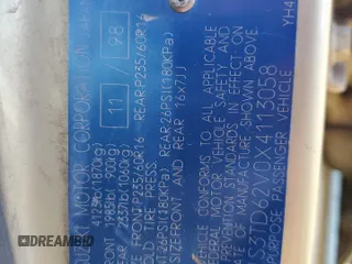 1999 Suzuki Grand Vitara JLX z VIN JS3TD62V0X4113058, wystawiony jako Copart lot #80089884 z przebiegiem 165 794 mil mil oraz Szkoda całkowita • Salvage title. Historia ofert i sprzedaży dostępna na DreamBid. Obrazek 13.
