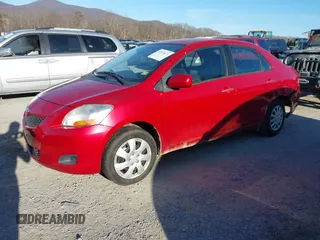 2010 Toyota Yaris with VIN JTDBT4K39A4070153, listed as a IAAI auction lot 41519671 with 169,090 mi miles and . Bid and sale history available at carsss.com. Image 2.