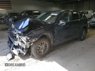 2020 Mazda CX-5 Touring z VIN JM3KFBCM5L1847751, wystawiony jako Copart lot #51189715 z przebiegiem 51 572 mil mil oraz Szkody całkowita. Historia ofert i sprzedaży dostępna na DreamBid. Obrazek 1.