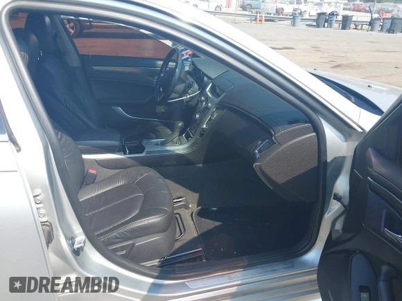 2012 Cadillac CTS with VIN 1G6DC5E51C0156873, listed as a IAAI auction lot 42587421 with 169,006 mi miles and . Bid and sale history available at DreamBid. Image 5.