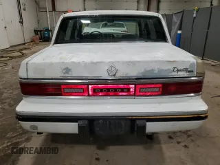 1992 Dodge Dynasty LE z VIN 1B3XC56RXND822802, wystawiony jako Copart lot #82799714 z przebiegiem 137 131 mil mil oraz Szkoda całkowita • Salvage title. Historia ofert i sprzedaży dostępna na DreamBid. Obrazek 6.