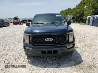 2023 Ford F-150 XL with VIN 1FTEW1CP8PKF56672, listed as a Copart auction lot 56911865 with 34,124 mi miles and Non repairable. Bid and sale history available at DreamBid. Image 13.