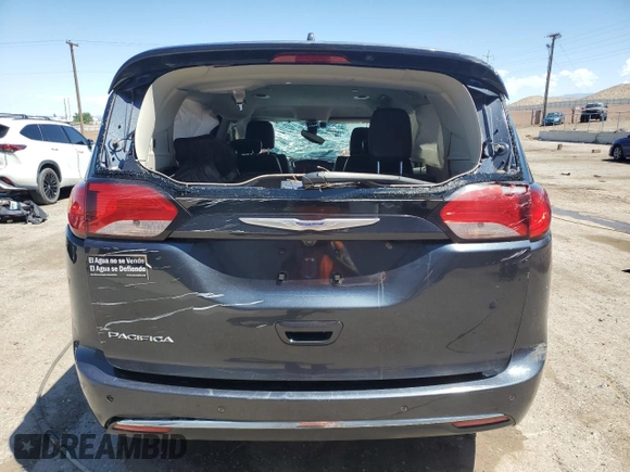 2020 Chrysler Pacifica Touring L with VIN 2C4RC1BG2LR209328, listed as a Copart auction lot 55634475 with 156,604 mi miles and Salvage title. Bid and sale history available at DreamBid. Image 6.