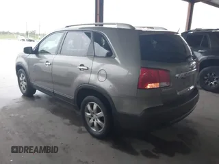 2011 Kia Sorento LX with VIN 5XYKT3A10BG004233, listed as a IAAI auction lot 42477034 with 239,555 mi miles and . Bid and sale history available at DreamBid. Image 3.