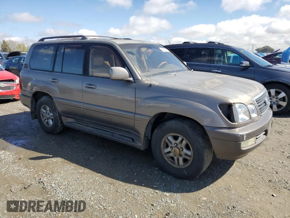 2000 Lexus LX 470 z VIN JT6HT00W9Y0120042, wystawiony jako Copart lot #49644355 z przebiegiem 188 992 mil mil oraz Czysty tytuł • Clean title. Historia ofert i sprzedaży dostępna na DreamBid. Obrazek 4.